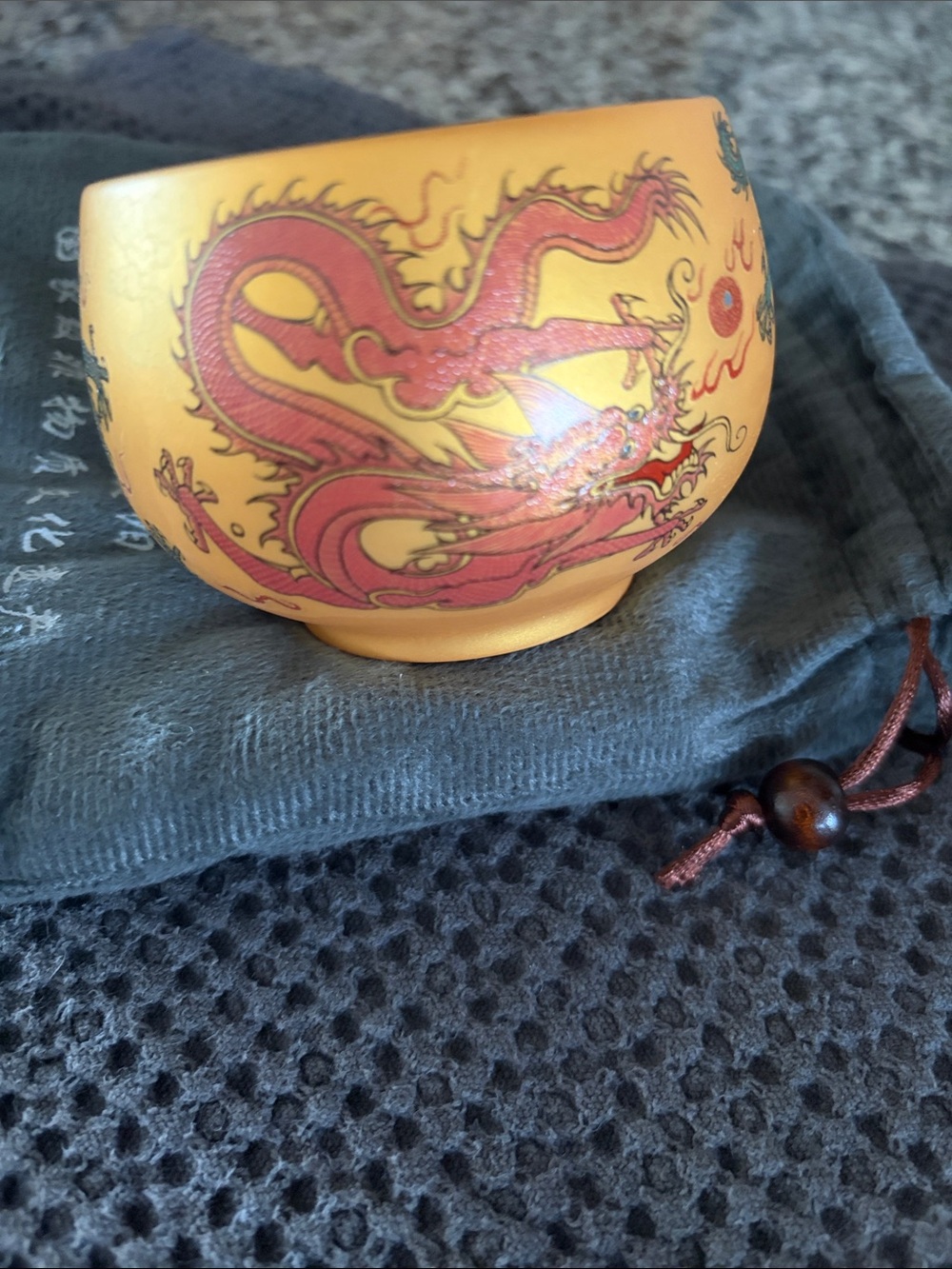 Collectible Yellow Ceramic Teacup with Red Dragon Motif . - cup
Decor -